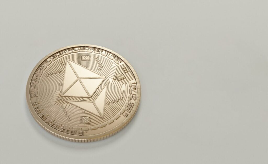 Round Gold-colored Ethereum Coin